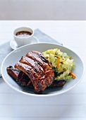 Marinated spare-ribs with coleslaw and barbecue sauce