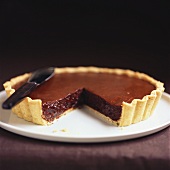 Chocolate tart, a piece cut
