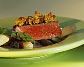 Beef fillet with muesli crust and roasted asparagus
