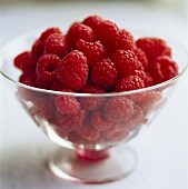 Fresh raspberries in glass bowl