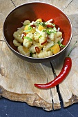 Gnocchi with pineapple and chili peppers