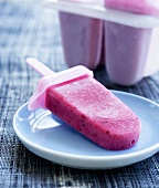 Home-made berry yoghurt ice cream on a stick