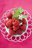 Raspberries with leaves and flowers