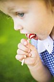 Small girl with lollipop