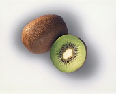 Whole and half kiwi fruit