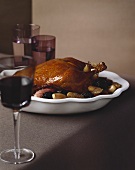 Roast duck with plums