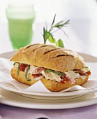 Chicken, onions and salad in ciabatta