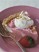 Piece of strawberry mousse pie with cream