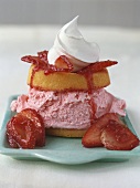 Sponge cake with strawberry ice cream, strawberries & cream