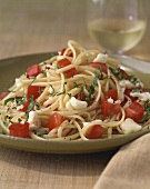 Ribbon pasta with tomatoes and cheese