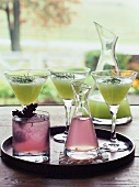 Different types of herb drinks on tray