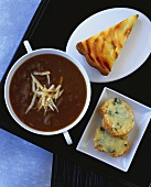 Onion soup, toasted cheese baguettes, piece of apple tart