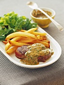 Beef fillet with mustard sauce, chips and salad