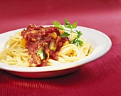 Spaghetti with tomato and courgette sauce