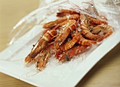 King prawns with ice in packaging