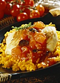 Coley with tomato sauce and rice