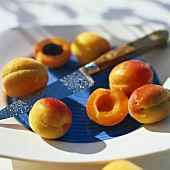 Whole and halved apricots