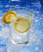 A glass of mineral water with slices of lemon