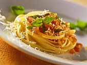 Pasta with tomato sauce, basil and Parmesan