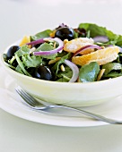 Salad leaves with olives and oranges