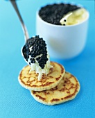 Blinis with creamed leeks and caviare
