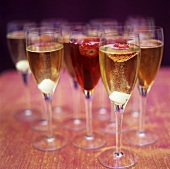Champagne glasses with fruit