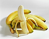 Bananas, one half-peeled