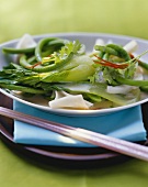 Green Thai vegetables with coconut and rice noodles