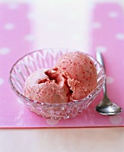 Two scoops of strawberry ice cream