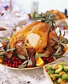 Roast turkey with cranberries, oranges and sage