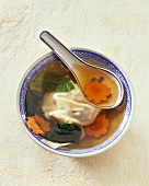 Clear broth with vegetables and won ton (Asia)