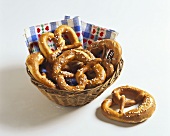 Salted pretzels in bread basket