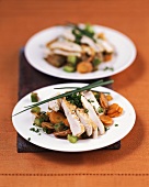 Turkey escalopes with stir-fried peanuts and carrots
