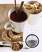Redcurrant tea punch with cinnamon sticks & crescent cookies