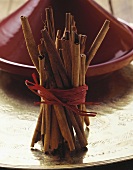 Cinnamon sticks, tajine behind