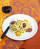 Tagliatelle with cherry tomatoes and goat's cheese