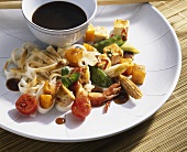 Egg noodles with vegetables, tofu and shrimps