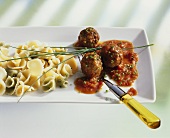 Mixed cappelletti with meatballs and tomato sauce