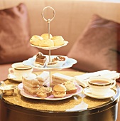 Tiered stand with cakes and snacks to serve with tea