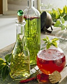 Raspberry vinegar, herb vinegar and herb oil