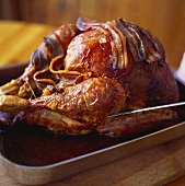 Roast turkey with slices of bacon