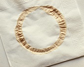 Paper napkin with impression of a coffee cup