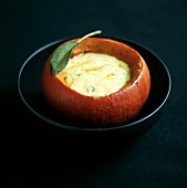 Cheese fondue with sage in hollowed-out squash