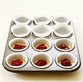 White chocolate with strawberry jelly in muffin cases 