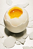 A soft-boiled egg, broken open