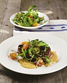 Steak with mustard and rocket