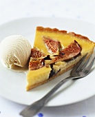 A piece of fig tart with vanilla ice cream