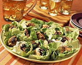 Grilled chicken on lettuce