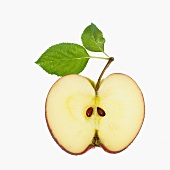 Halbierter Apfel mit Stiel, zwei Blättern und Kernen