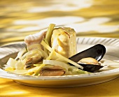 Cod fillet with mussels and leeks
